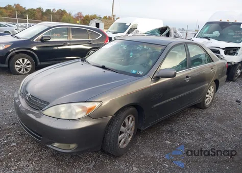 2003 Toyota Camry Xle z USA, uszkodzony, nr VIN 4T1BE30K83U654640